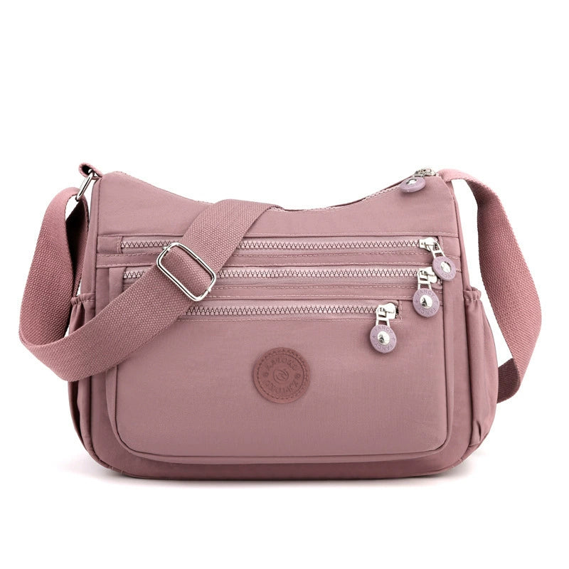 🎒✨ Lightweight Nylon Crossbody Bag – Multi-Pocket, Water-Resistant, Adjustable 🔧