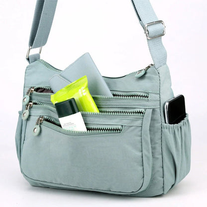 🎒✨ Lightweight Nylon Crossbody Bag – Multi-Pocket, Water-Resistant, Adjustable 🔧