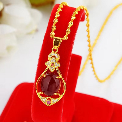 Elegant Four-Leaf Clover Teardrop Necklace